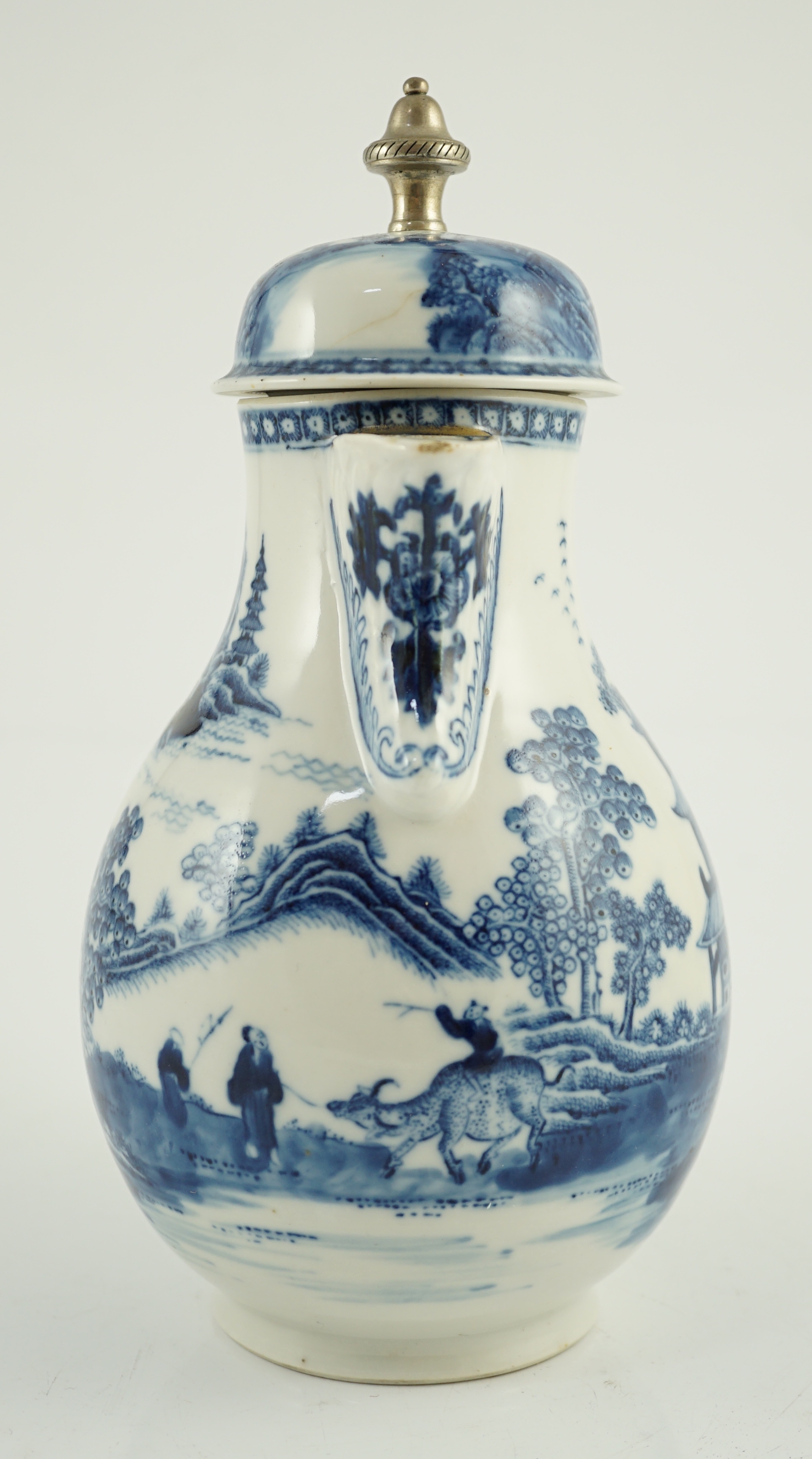 A Chinese blue and white jug and cover, Qianlong period, later metal finial